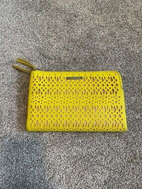 Stella & Dot Yellow Perforated Zip Clutch